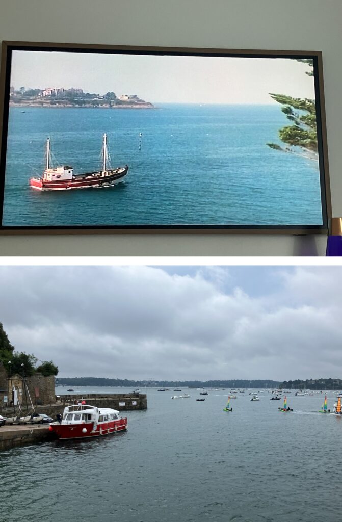 Split image showing a scene from The Darling Buds of May featuring a fishing boat in blue waters on a television screen, and a photograph of a red ferry in a harbor with various small boats and cloudy skies.