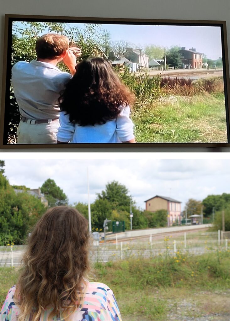 A comparison image showing a scene from 'The Darling Buds of May' on a TV screen alongside a photograph of a woman standing at the same filming location, looking towards the train tracks.